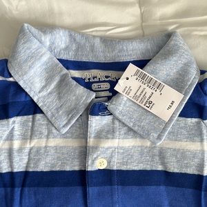 New, with tag polo size L (10-12) boys